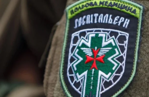 Добровольці теж захищали Україну: УГСПЛ допомогла матері загиблої «Госпітальєрки» отримати законний статус